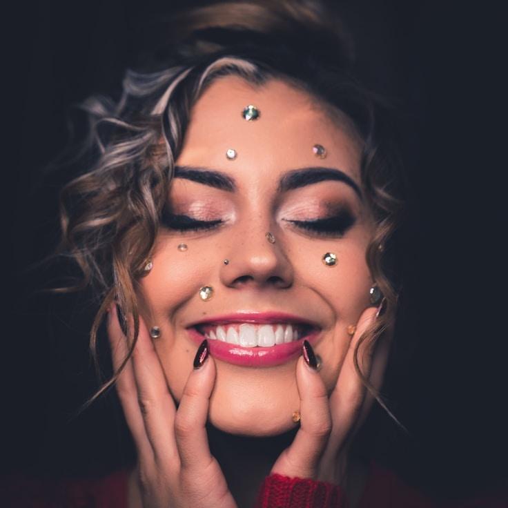 Alex Kim, Lead Design Curator at AtlasCoreGarden, reviewing corporate floral arrangements